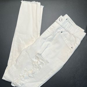 Brand new! HUE white ripped jeggings.
